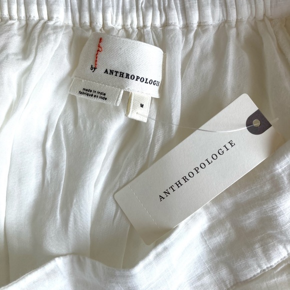 By Anthropologie EYELET ASYMMETRICAL MIDI SKIRT in Ivory - Picture 7 of 9